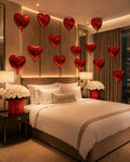 Floral room decoration with red heart balloons and white rose boxes - LaFia Flowers