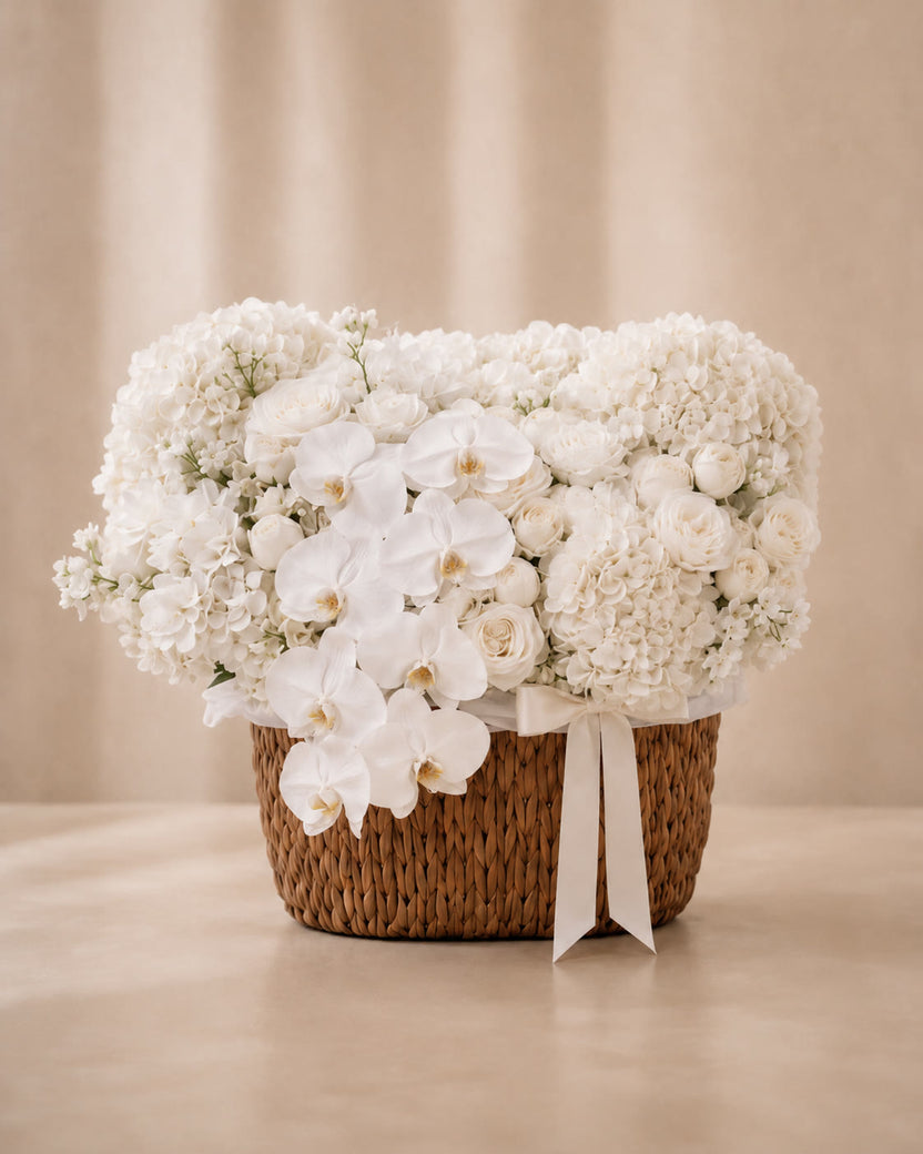 Ivory Orchid Garden Basket with white hydrangeas, roses and cascading orchids — LaFia Flowers Los Angeles