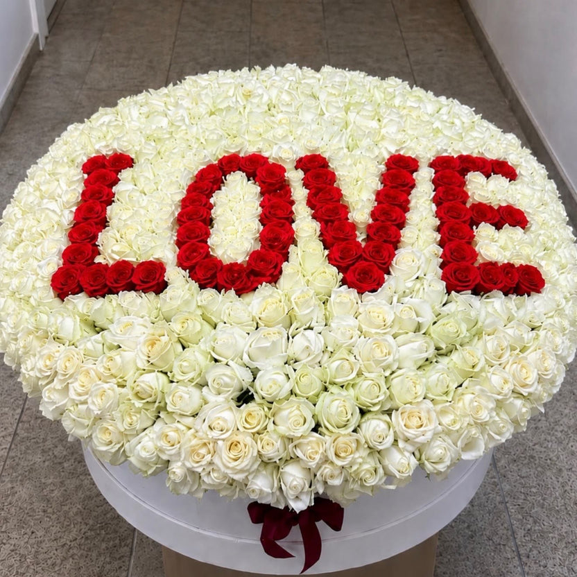 Custom word box — LOVE spelled in fresh red roses — LaFia Flowers Los Angeles
