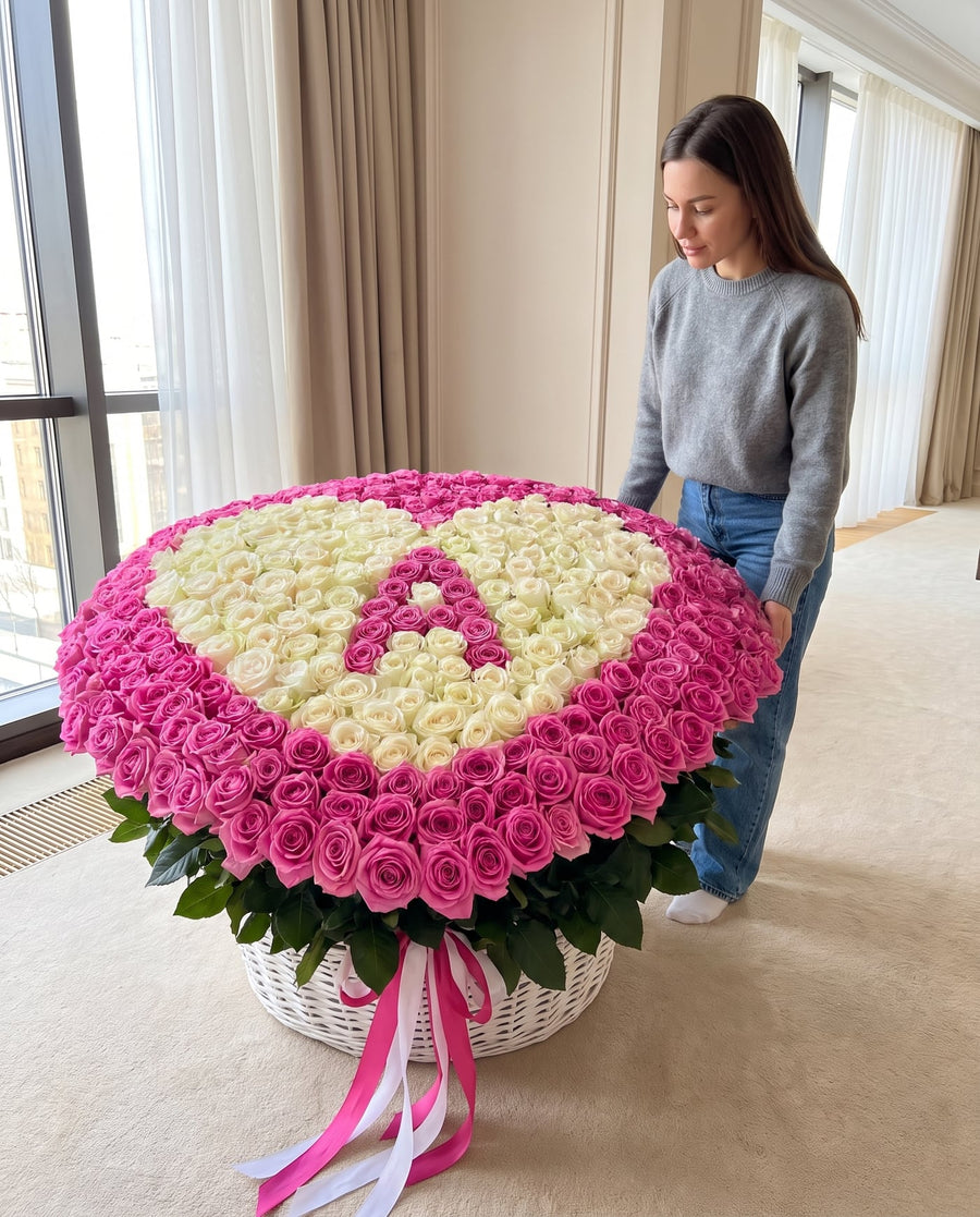 Single initial heart rose arrangement shown in a bright room for scale - LaFia Flowers