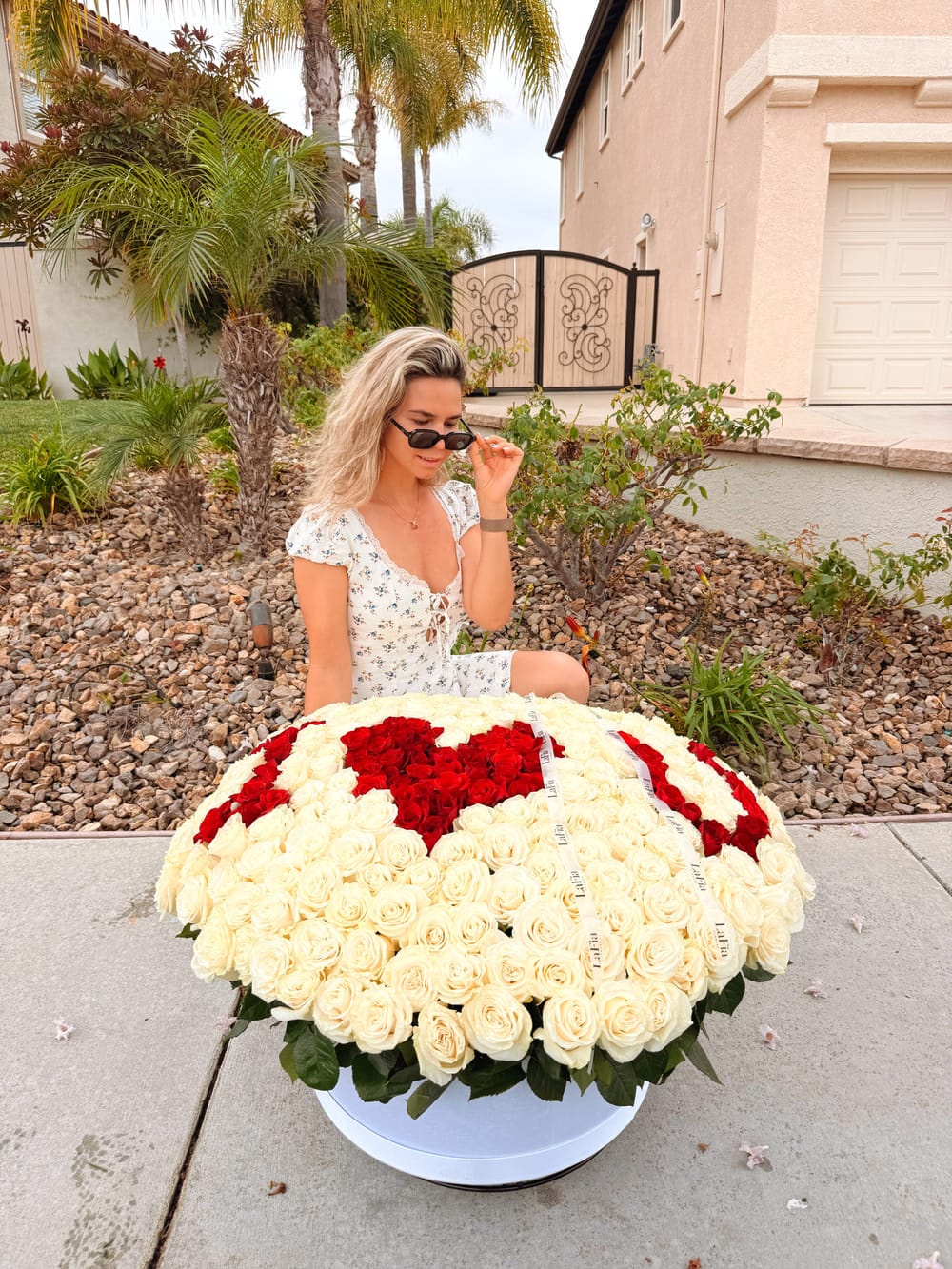 Custom floral lettering arrangement made by LaFia Flowers